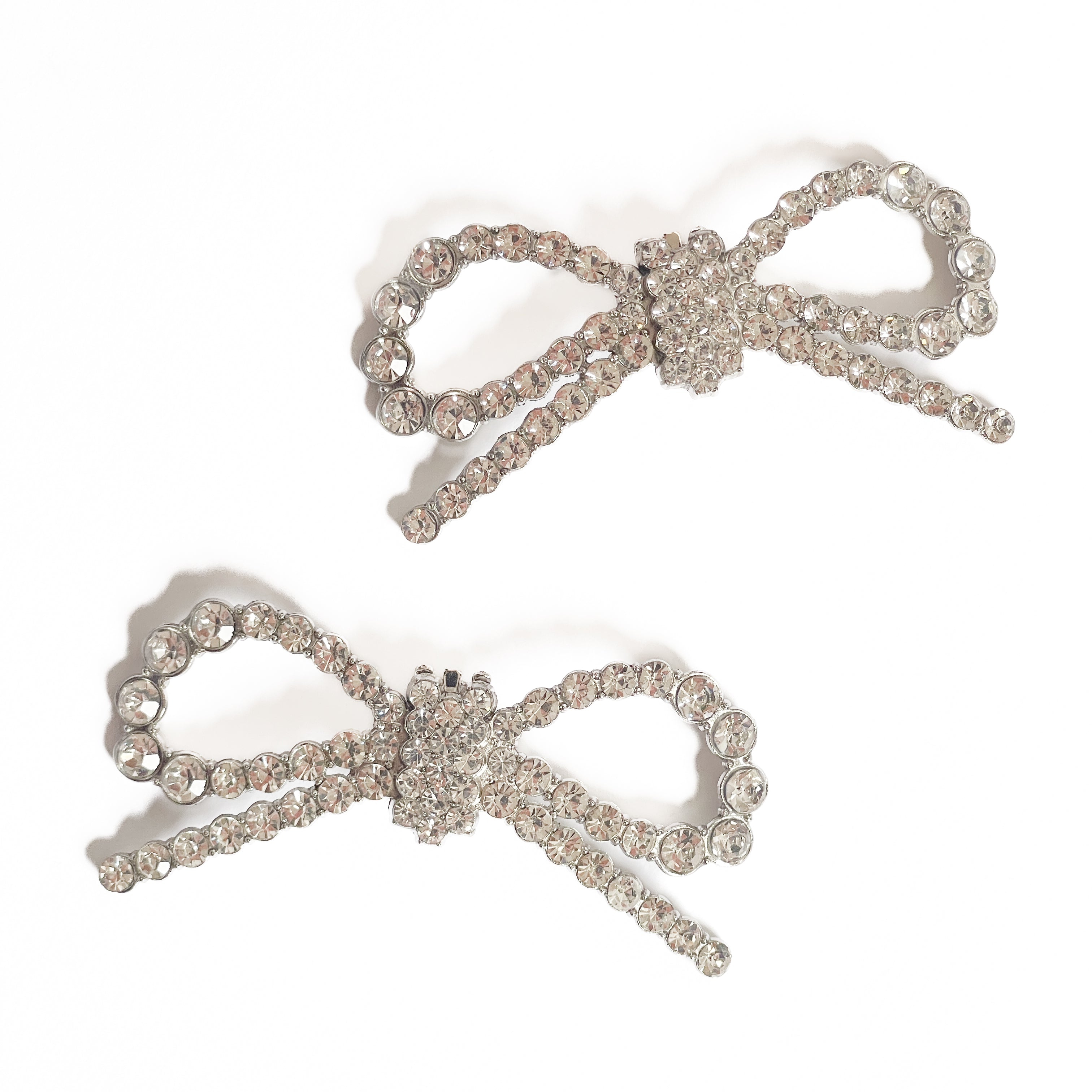 BOW-STRASS-accessori-fiocco-vista-frontale-paio-metallo-argento-strass-cry