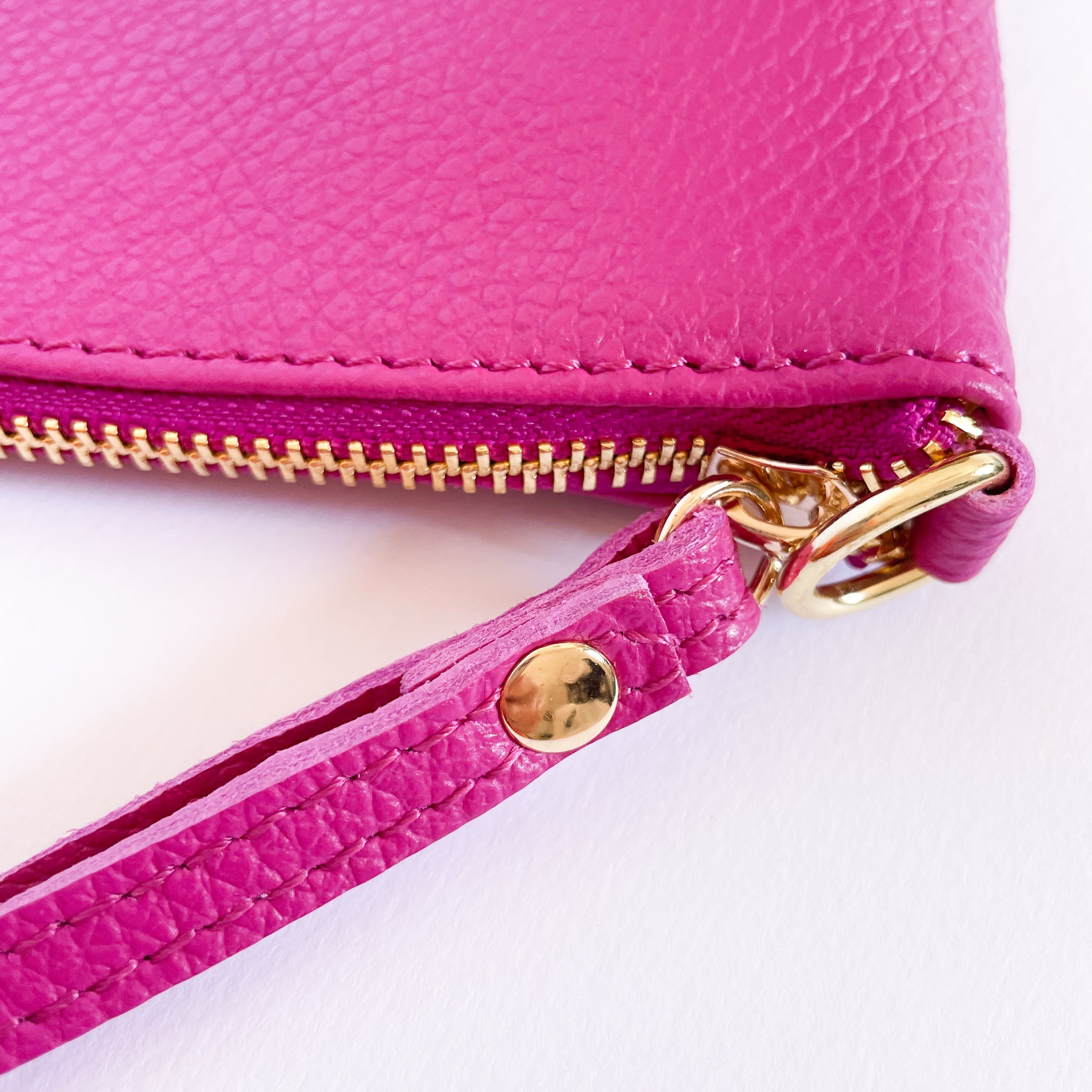 OLIVIA-BAG-borse-pochette-vista cerniera-manichetto-vitello-fucsia